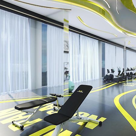 Royal M Al Aqah Beach Resort By Gewan Buitenkant foto The gym at the hotel