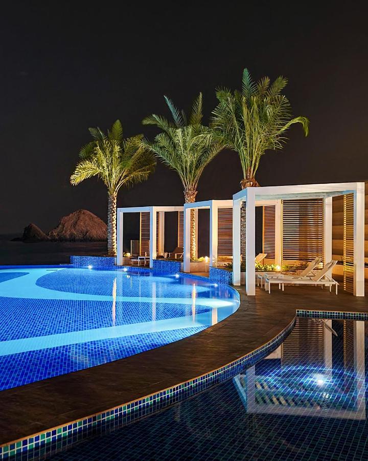 Royal M Al Aqah Beach Resort By Gewan Buitenkant foto The pool at the Westin Abu Dhabi