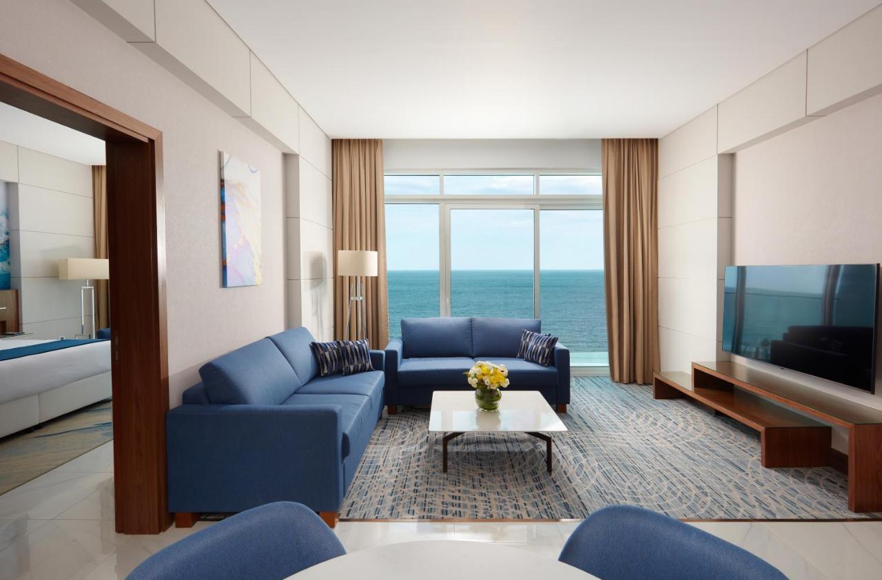 Royal M Al Aqah Beach Resort By Gewan Buitenkant foto A living room at the hotel
