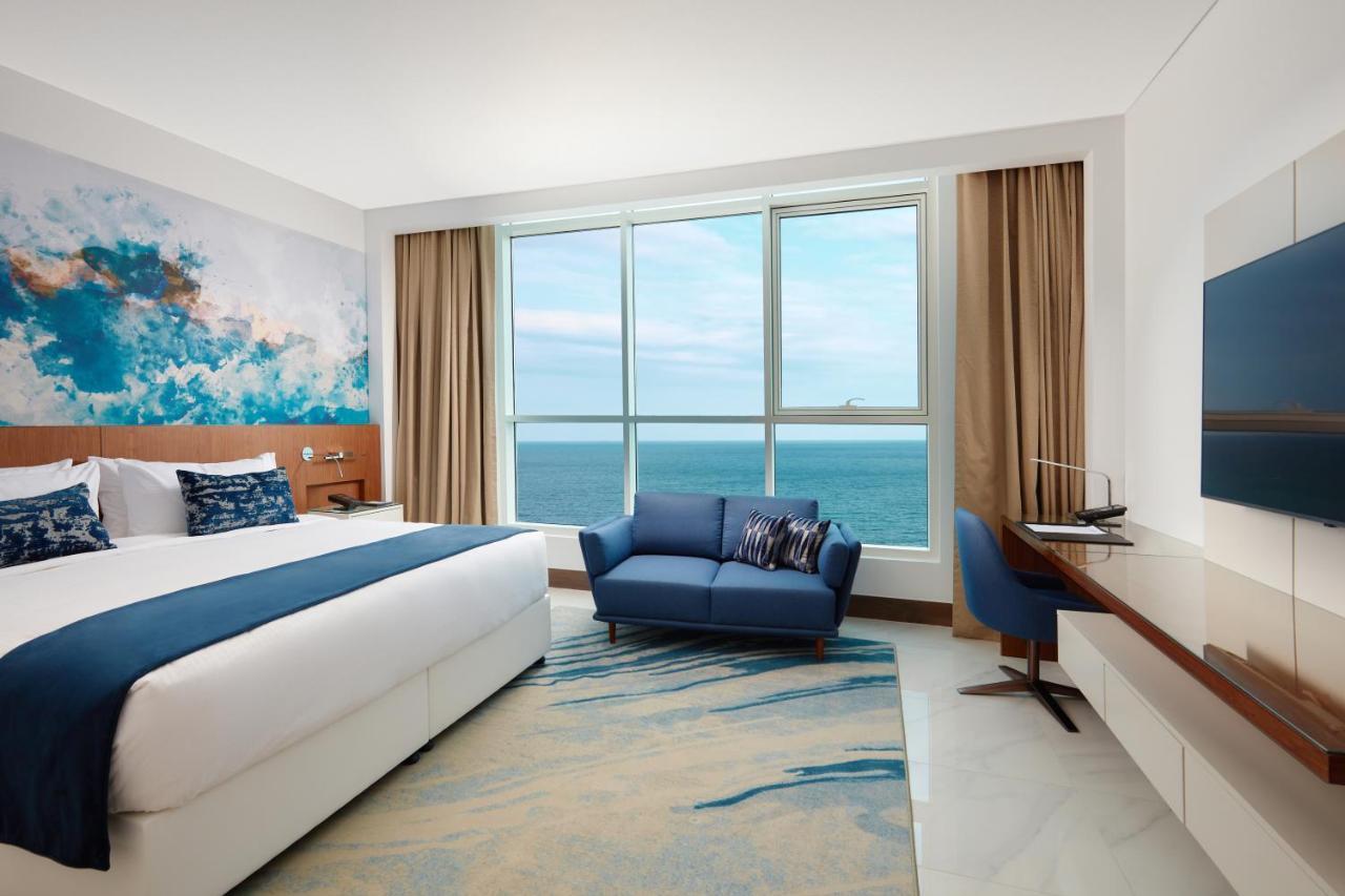 Royal M Al Aqah Beach Resort By Gewan Buitenkant foto Deluxe Room