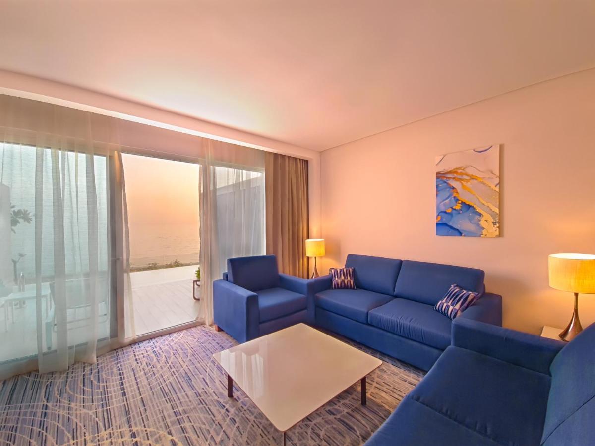 Royal M Al Aqah Beach Resort By Gewan Buitenkant foto Living room