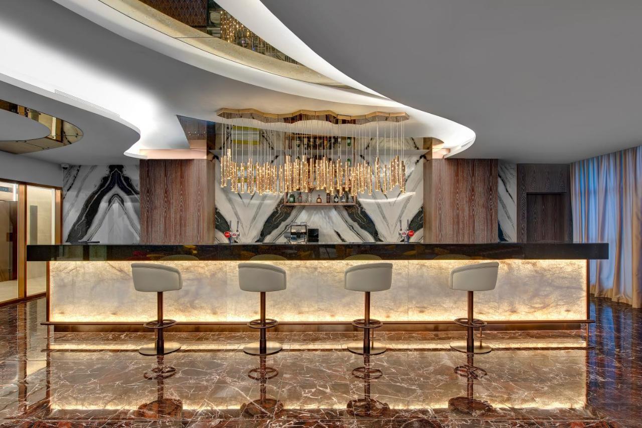 Royal M Al Aqah Beach Resort By Gewan Buitenkant foto The bar at the 101 lounge