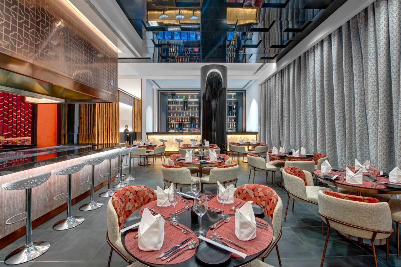 Royal M Al Aqah Beach Resort By Gewan Buitenkant foto The interior of the restaurant