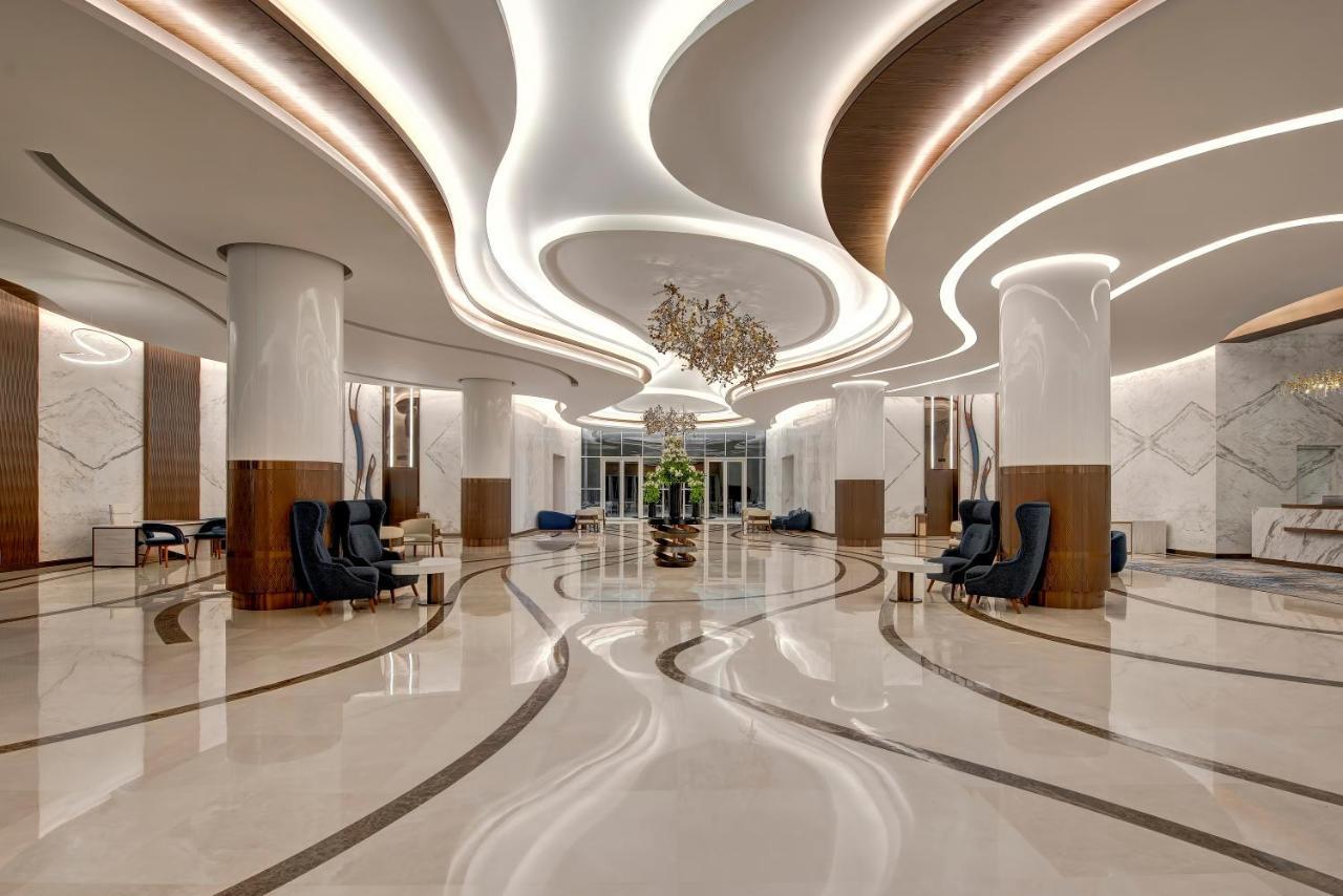 Royal M Al Aqah Beach Resort By Gewan Buitenkant foto The lobby of the hotel